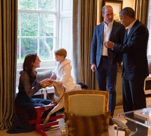 Prince George rides a Wilson Rocking Horse